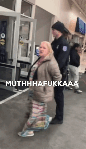 Crazy Meijer Lady being excorted by Michigan police