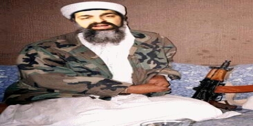 Truthneversleeps in his white thawb and military jacket
